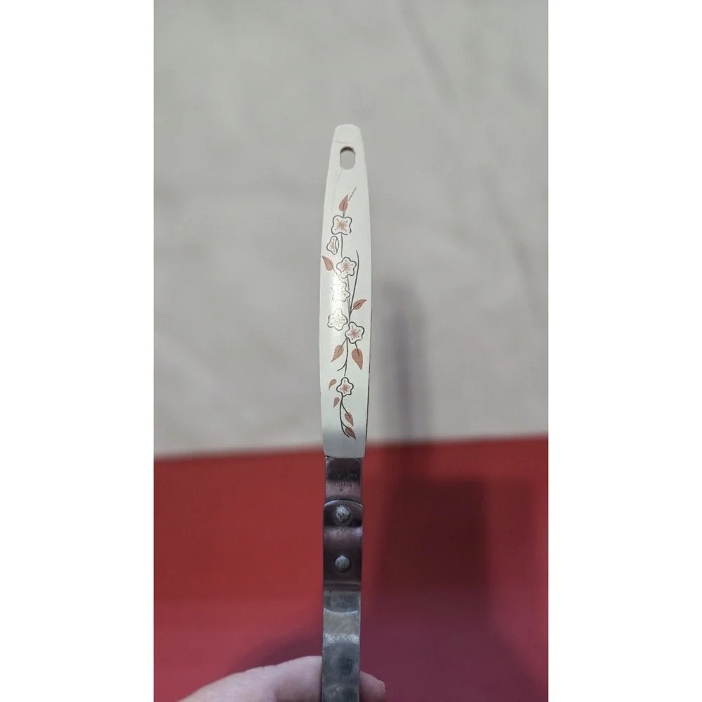 Masterpiece Masher Kitchen Tool Stainless Steel With A Cherry Blossom Pattern